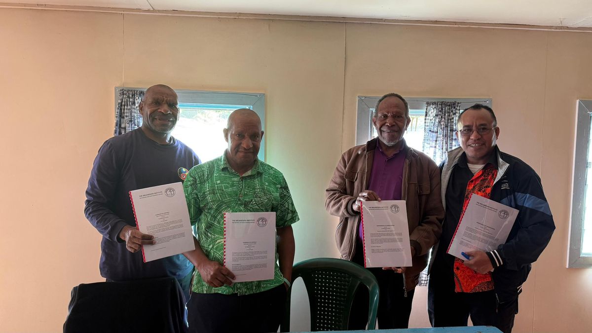 Partners signing an agreement to roll out the Community Curriculum