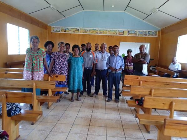 A Community Curriculum session in the community. Evangelical Bible Church, Eastern Highlands. June 2026.