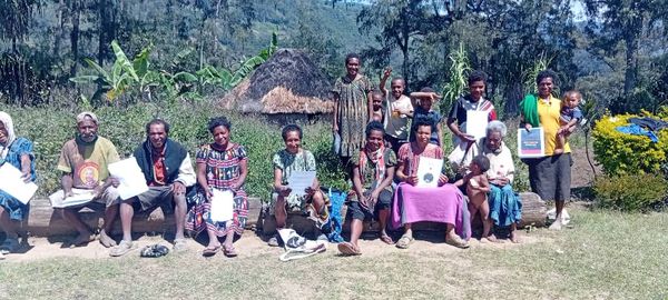 A Community Curriculum session in the community. Gutnius Lutheran Church, Takamanda, Enga. June 2026.