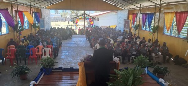 Participants fill the church hall for the graduation ceremony. Foursquare Gospel Church, Banz, Jiwaka. September 2026.
