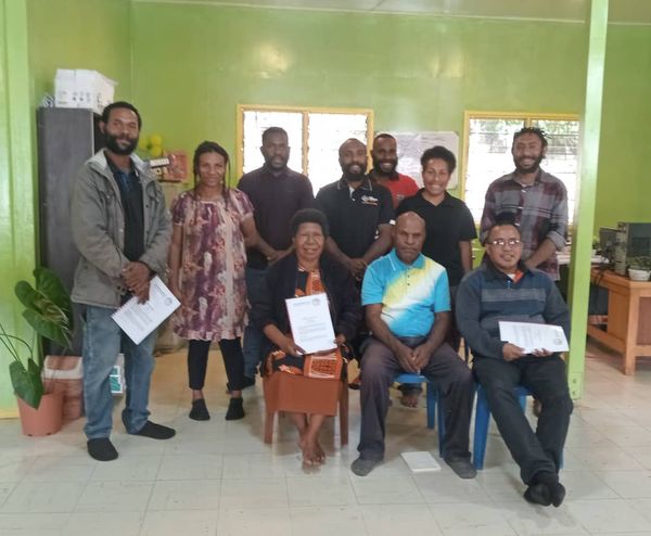 Signing the partnership agreement to roll out the Community Curriculum. Maunkui (SDA), Simbu. March 2026.