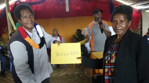 A graduate receives her certificate. Catholic Diocese of Mendi, Lower Mendi Parish Centre, Tepe, Southern Highlands. September 2026.